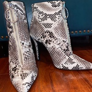 snakeskin high heel booties